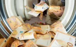 Euro,Money,Banknotes,In,A,Washing,Machine,,Closeup,Inside,View.