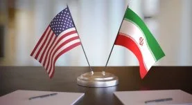 USA and Mexican flags on table. Negotiation between Mexico and U